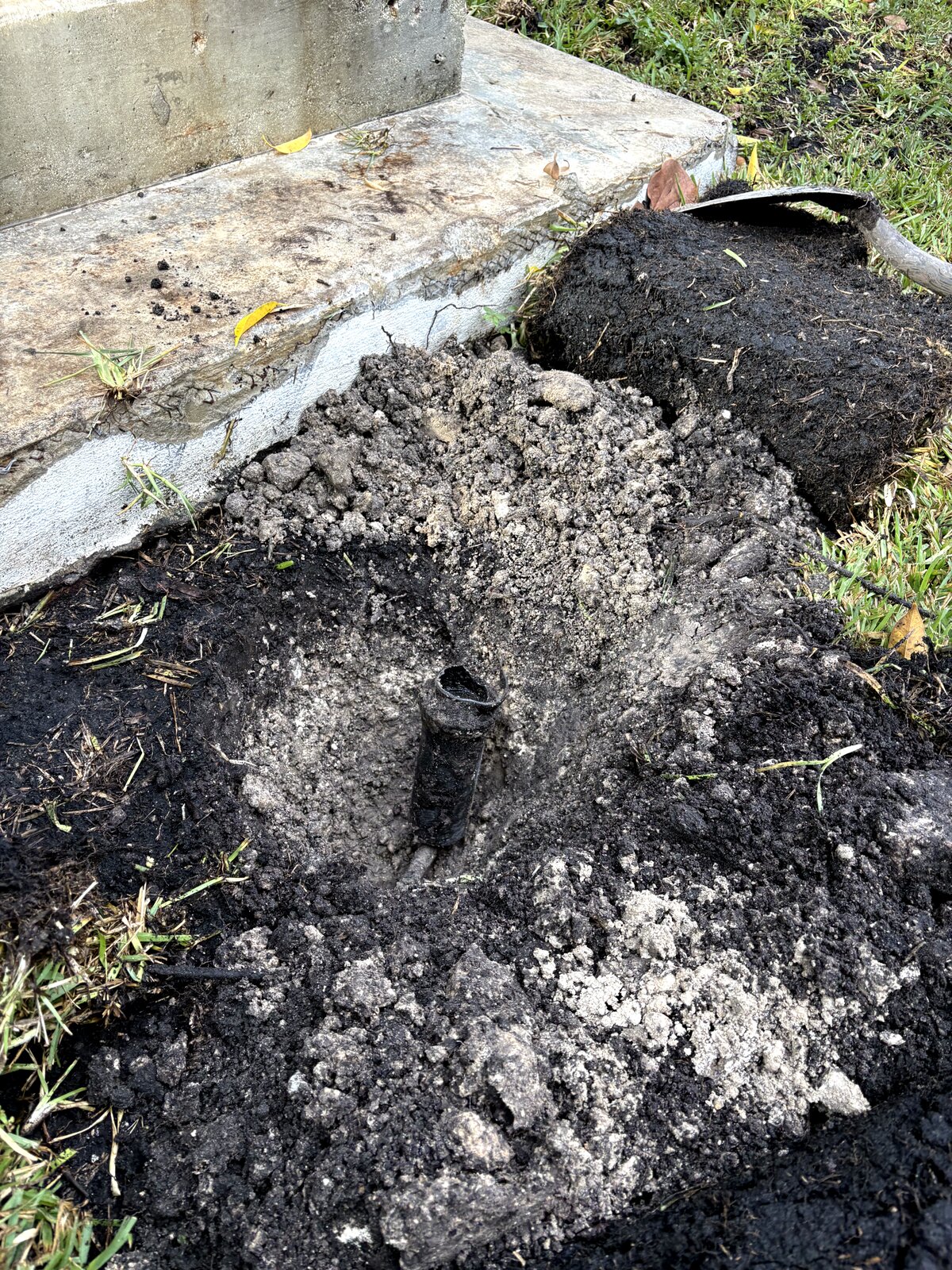 broken underground sprinkler pipe dug up for leak detection and repair in Miami