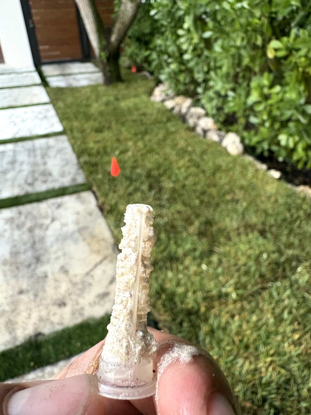calcified sprinkler nozzle causing low pressure and weak coverage in Miami lawn