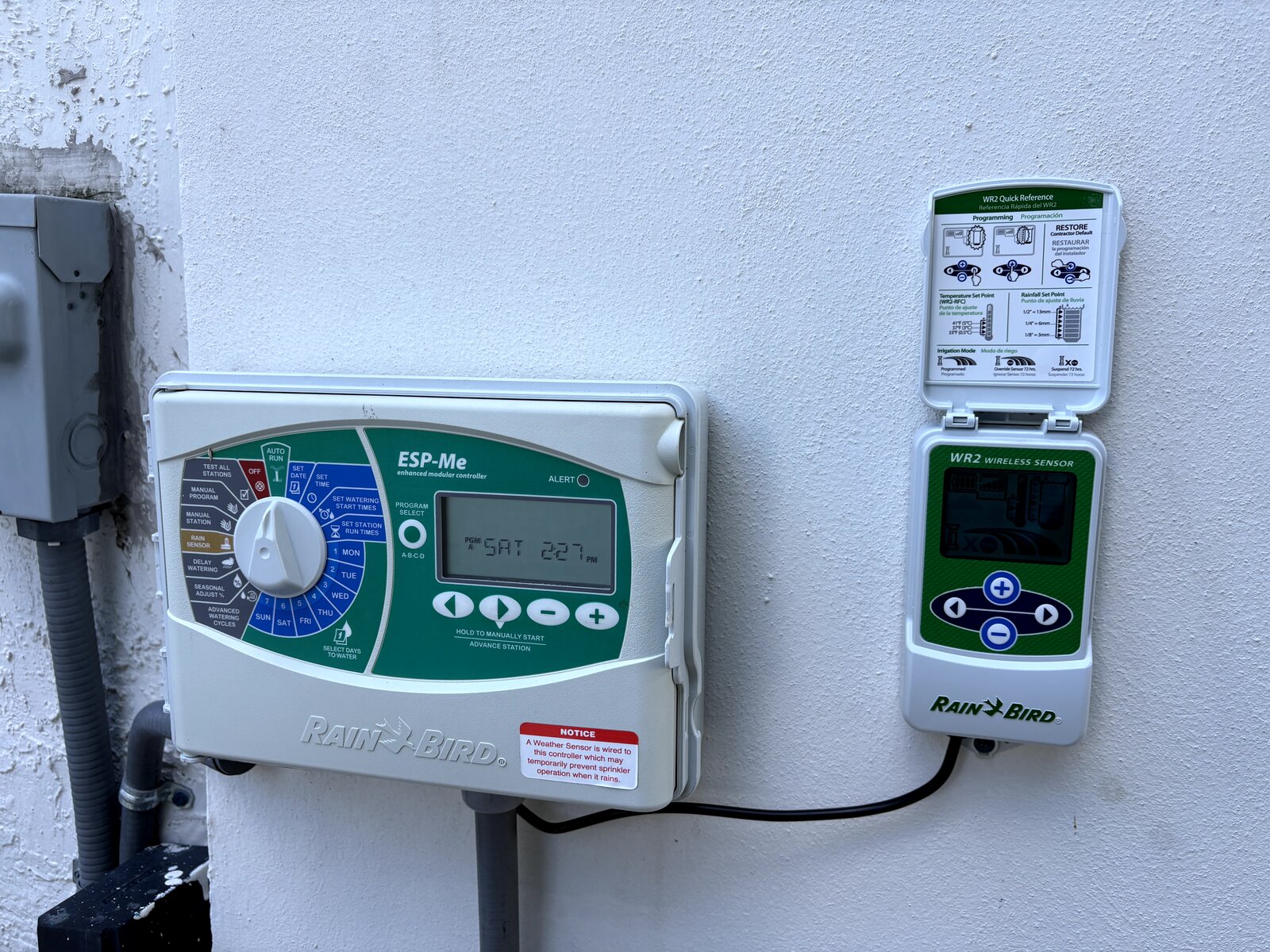 Rain Bird ESP-Me controller with rain sensor controlling a drip and zone setup in Miami