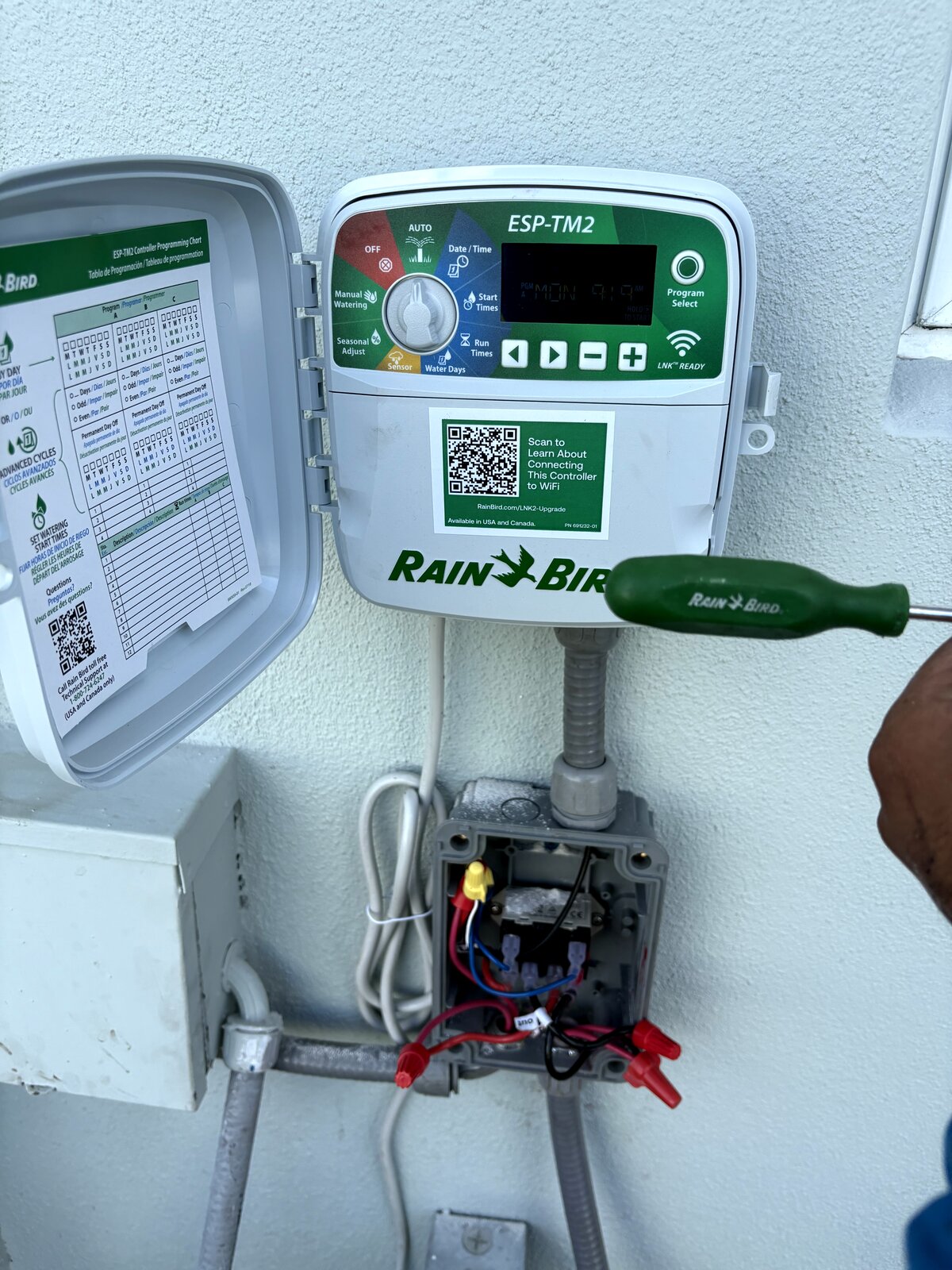 new Rain Bird ESP-TM2 sprinkler controller installed on a Miami home with surge protection